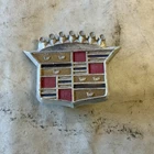 Cadillac Wheel Cover Crest Emblem Ornament RG44 Used. Price: $45.00.